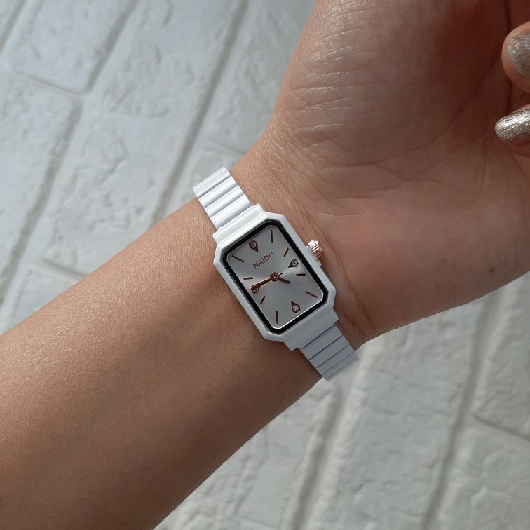 خرید ساعت زنانه مربعی نایدو بند ریلی | مدل مینیمال رنگی ترند ۲۰۲۶| کد ۵۰۹ - تصویر 5