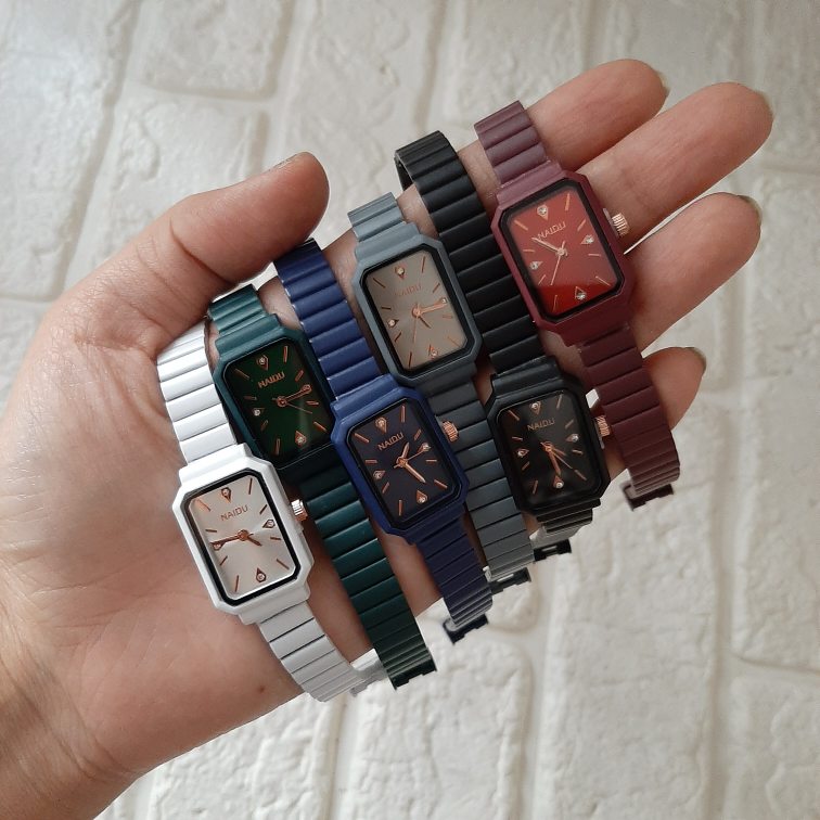 خرید ساعت زنانه مربعی نایدو بند ریلی | مدل مینیمال رنگی ترند ۲۰۲۶| کد ۵۰۹ - تصویر 7